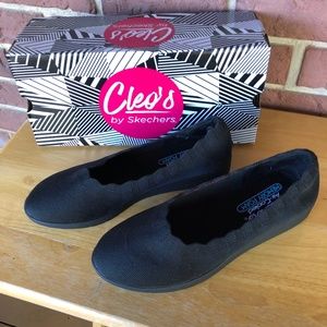 Cleo’s by Sketchers,  black “flex-wedge” flat, size 7; box and dust bag included